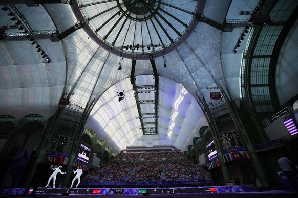 PARIS, FRANCE - JULY 30: Xu Nuo of Team China competes during the Fencing - Women&#039;s Epee Team Finals against Team Poland on day 4 of the Paris 2024 Olympic Games at the Grand Palais on July 30, 2 ...