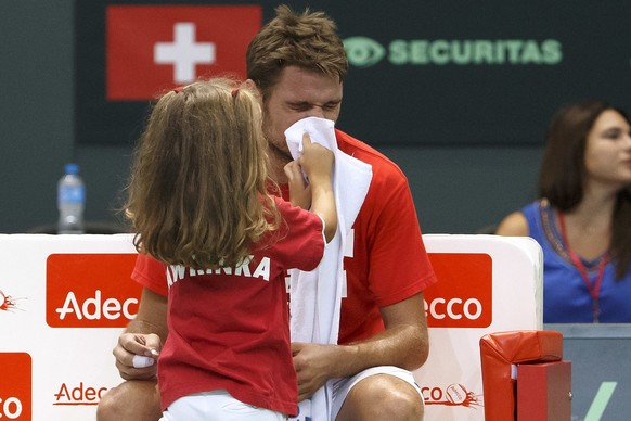 Switzerland&#039;s Stan Wawrinka&#039;s daughter Alexia dries the face of her father Stanislas &quot;Stan&quot; Wawrinka, of Switzerland, during a training session of the Swiss Davis Cup Team, prior t ...
