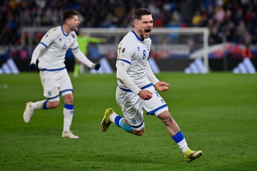 Florent Muslija of Kosovo celebrates after scoring his side's third goal during a World Cup 2026 qualifying soccer match between Slovakia and Kosovo in Bratislava, Slovakia, Thursday, March 26, 2 ...