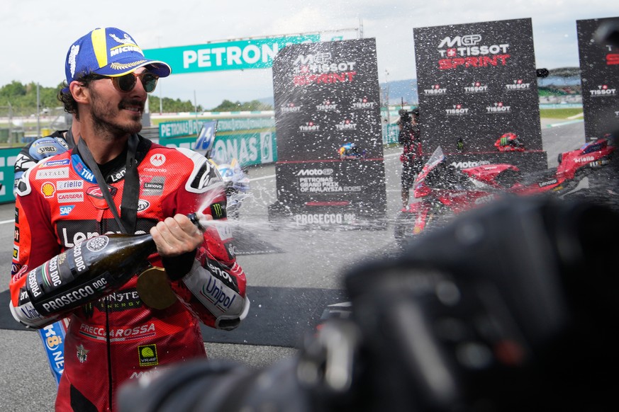 Italian rider Francesco Bagnaia of the Ducati Lenovo Team celebrates after winning the MotoGP sprint race of the Grand Prix of Malaysia at the Sepang International Circuit in Sepang, Malaysia, Saturda ...