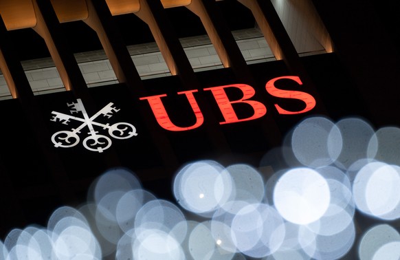 10.12.2021, Hessen, Frankfurt/Main: Das Logo der UBS Group AG auf dem Sitz der Bank in der Frankfurter Innenstadt. Ein Pariser Berufungsgericht hat die Vorw