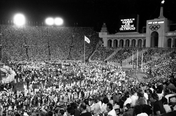 Athletes from competing nations meet in the infield of Los Angeles Memorial Coliseum for the closing ceremonies of the 23rd Olympiad, Aug. 12, 1984, in Los Angeles. (AP Photo)