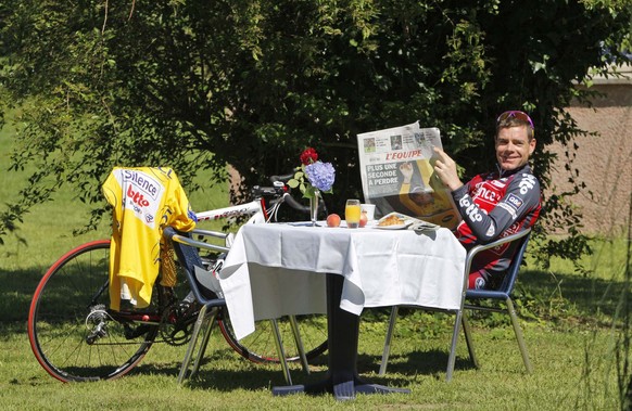 New overall leader Cadel Evans of Australia is seen as he poses for photographers on the rest day of the Tour de France cycling race near Pau, southern France, Tuesday July 15, 2008. (AP Photo/Christo ...