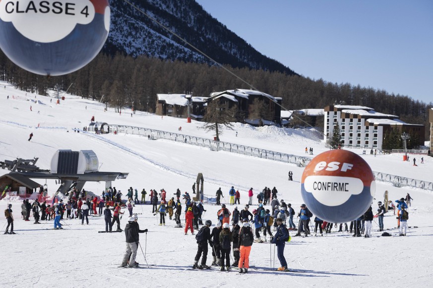 Montgenevre Ski Resort Illustrations - France Many skiers are on the snow front of the ski resort. Illustrative image of the Montgenevre ski resort during the February holidays in Montgenevre, Hautes- ...