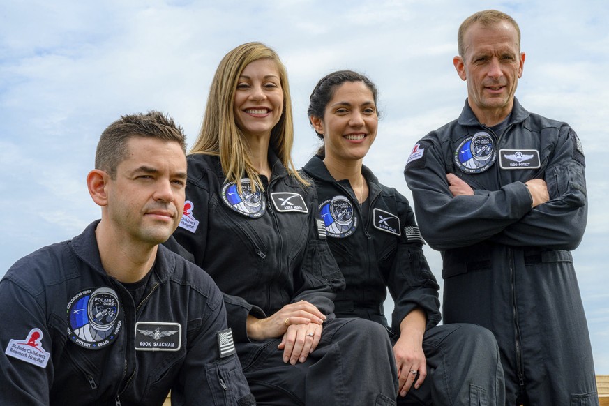 This image provided by Polaris shows, from left, Tech entrepreneur Jared Isaacman, SpaceX employees Anna Menon and Sarah Gillis and Scott Poteet, a retired Air Force lieutenant colonel. The billionair ...