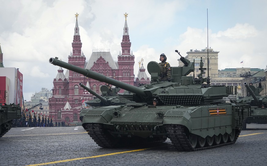 Russian tanks roll during the Victory Day military parade in Moscow, Russia, Monday, May 9, 2022, marking the 77th anniversary of the end of World War II. (AP Photo/Alexander Zemlianichenko)