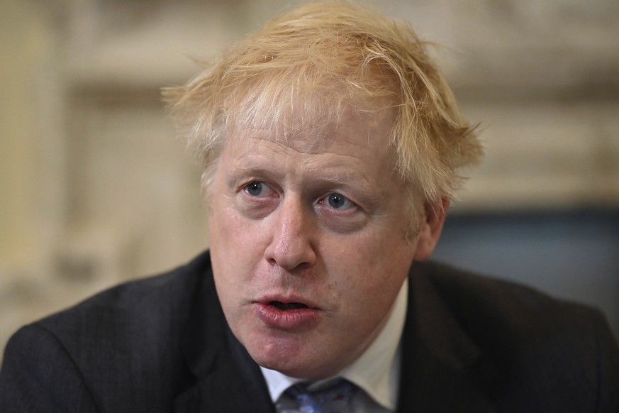 FILE - In this Friday, Sept. 17, 2021 file photo, Britain&#039;s Prime Minister Boris Johnson, speaks during the first Cabinet meeting since the reshuffle, at 10 Downing Street, in London. British Pri ...