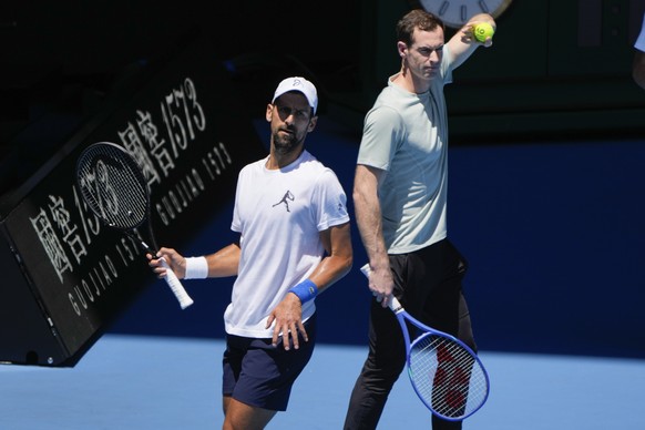 Serbia&#039;s Novak Djokovic, left, with his coach Andy Murray during a practice session ahead of the Australian Open tennis championship in Melbourne, Australia, Saturday, Jan. 11, 2025. (AP Photo/Ng ...