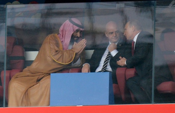 epa06808133 (from left) Saudi Arabia&#039;s Crown Prince Mohammad bin Salman, FIFA president Gianni Infantino and Russian president Vladimir Putin during the FIFA World Cup 2018 group A preliminary ro ...