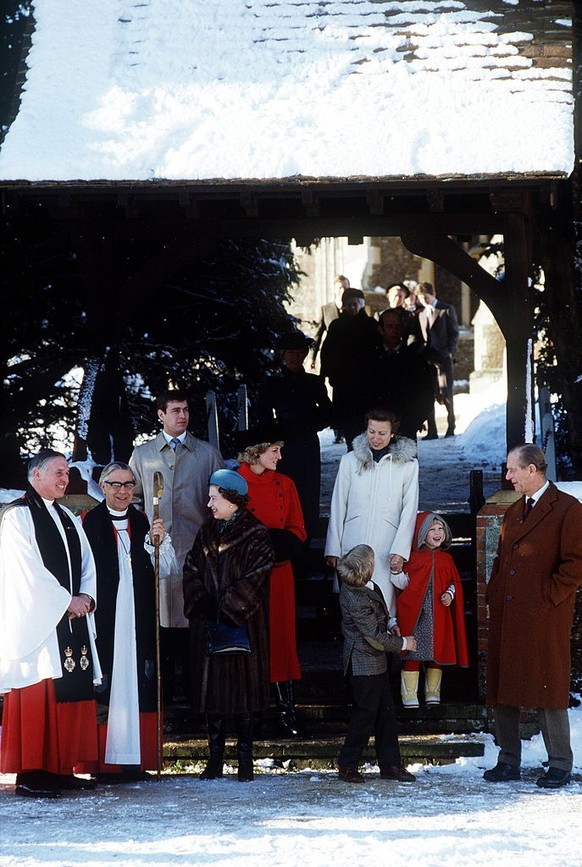 SANDRINGHAM, UNITED KINGDOM - DECEMBER 29: Diana, Princess Of Wales, Smiling And Joking With Prince Philip As They Leave Sandringham Church In The Snow After Attending Christmas Day Service With Princ ...