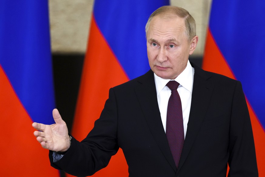 Russian President Vladimir Putin gestures while speaking to the media after the Shanghai Cooperation Organisation (SCO) summit in Samarkand, Uzbekistan, Friday, Sept. 16, 2022. (Sergei Bobylev, Sputni ...