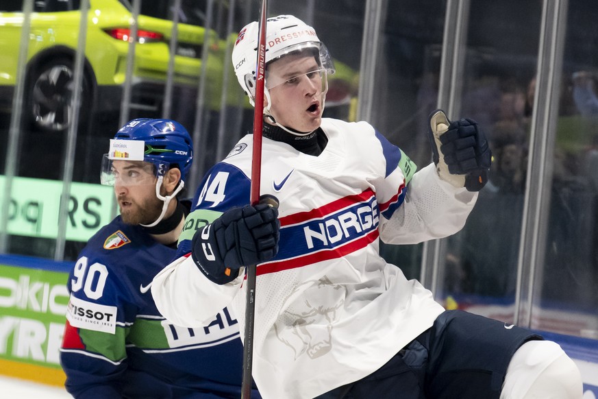 Norway's Tinus Luc Koblar, right, celebrates his goal (4-0) front of Italy's Dylan di Perna, during the 2026 IIHF Men's Ice Hockey World Championship preliminary round group B game betw ...