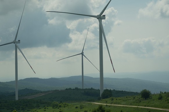 This picture taken on May 25, 2026, shows wind turbines of the Orivska Wind Farm near Oriv, Lviv region amid the Russian invasion of Ukraine. (Photo by Marian PAVLYK / AFP)