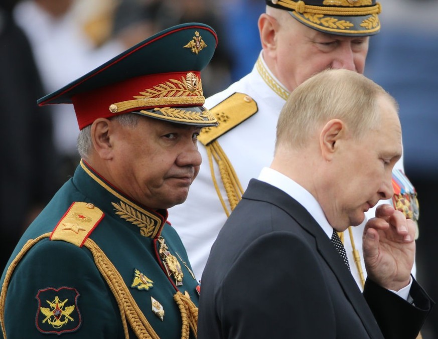 SAINT PETERSBURG, RUSSIA - JULY 31: (RUSSIA OUT) Russian President Vladimir Putin (R) and Defense Minister Sergei Shoigu (L) seen during the Navy Day Parade, on July, 31 2022, in Saint Petersburg, Rus ...