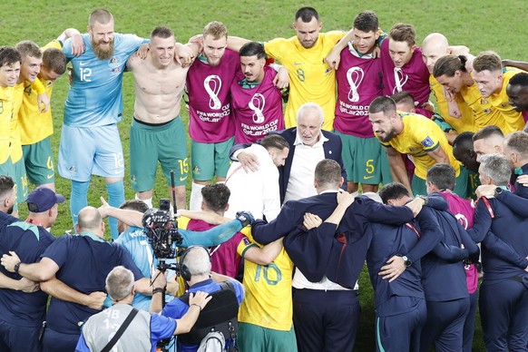 epa10339362 The team of Australia celebrate after winning the FIFA World Cup 2022 group D soccer match between Australia and Denmark at Al Janoub Stadium in Al Wakrah, Qatar, 30 November 2022. EPA/Run ...