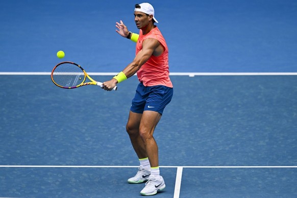 epa10406148 Rafael Nadal of Spain in action during a practice session ahead of the 2023 Australian Open tennis tournament at Melbourne Park in Melbourne, Australia, 15 January 2023. EPA/LUKAS COCH AUS ...