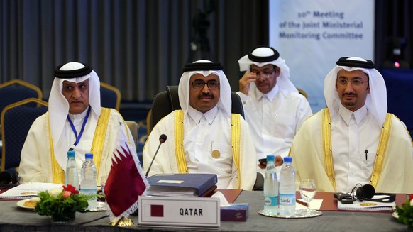 epa07041446 Qatar&#039;s Minister of Energy Mohammed bin Saleh al-Sada (C) attends the 10th OPEC and non-OPEC Joint Ministerial Monitoring Committee (JMMC), in Algiers, Algeria, 23 September 2018. The ...