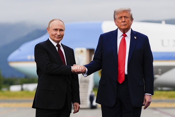 President Donald Trump greets Russia&#039;s President Vladimir Putin, Friday, Aug. 15, 2025, at Joint Base Elmendorf-Richardson, Alaska. (AP Photo/Julia Demaree Nikhinson)
Trump Putin