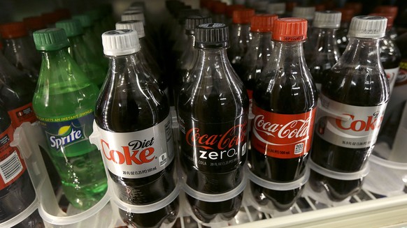 A shelf of soft drinks are shown in a refrigerator at K &amp;amp; D Market in San Francisco, Wednesday, Oct. 1, 2014. A tax on sodas and other sugar-laden drinks that voters and courts in other parts  ...