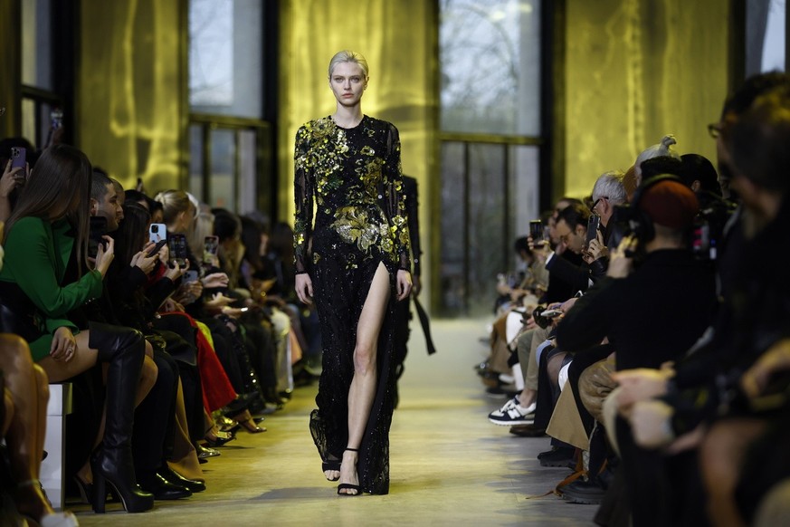epa10503018 A model presents a creation from the Fall/Winter 2023/24 Womenswear collection by Elie Saab during the Paris Fashion Week, in Paris, France, 04 March 2023. The presentation of the Women&#0 ...