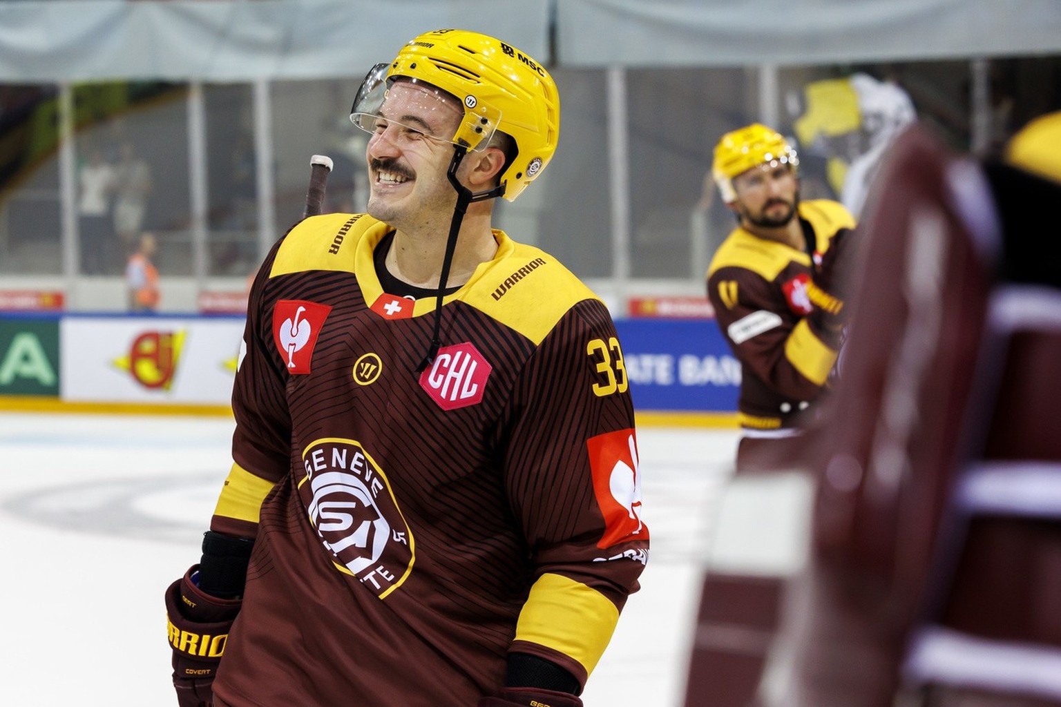 Geneve-Servette&#039;s forward Alessio Bertaggia #33 smiles as winner after defeating the team Rouen Dragons, during a Champions Hockey League game between Switzerland&#039;s Geneve-Servette HC and Fr ...