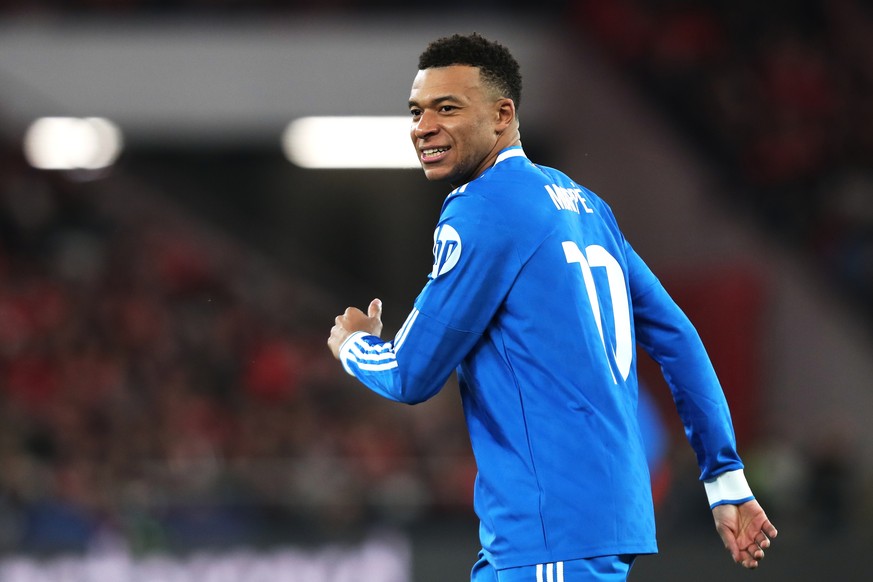 Real Madrid's Kylian Mbappe during a Champions League opening phase soccer match between SL Benfica and Real Madrid in Lisbon, Portugal, Tuesday, Feb. 17, 2026. (AP Photo/Pedro Rocha)
Kylian Mbap ...