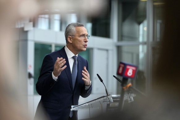NATO Secretary General Jens Stoltenberg speaks with the media as he arrives for a meeting of NATO foreign ministers at NATO headquarters in Brussels, Wednesday, April 3, 2024. NATO foreign ministers g ...