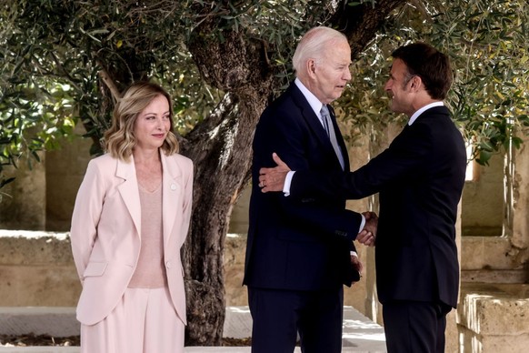 FASANO, ITALY - JUNE 13: Italy's Prime Minister Giorgi Meloni greets President of France Emmanuel Macron during the first day of the G7 meeting at Borgo Egnazia resort, on June 13, 2024 in Fasano ...