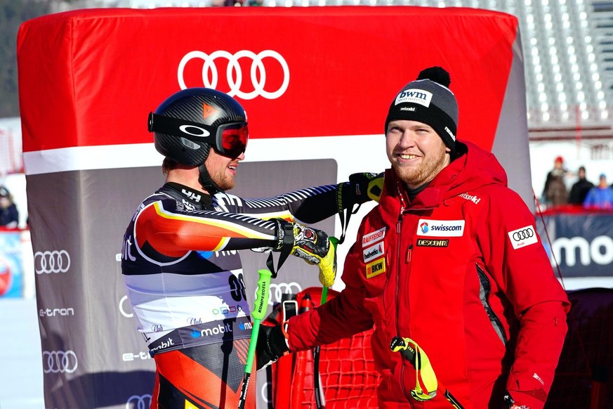 epa09800727 Cameron Alexander (L) of Canada and Niels Hintermann (R) of Switzerland react in the finish area during the men&#039;s Downhill race of the FIS Alpine Skiing World Cup in Kvitfjell, Norway ...