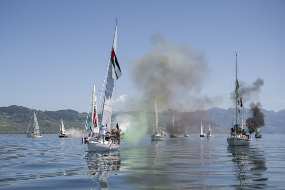 Boats from the Gaza Freedom Flotilla take part in a rally "The G7 Can stop the Genocide" on Lake Geneva ahead of the upcoming Evian G7 summit, off the coast of Lausanne, Switzerland, Saturda ...