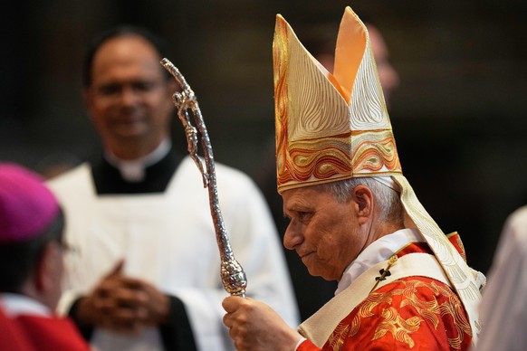 Pope Leo XIV arrives to celebrate a Mass where he confers the pallium on newly appointed metropolitan archbishops, in St. Peter's Basilica, at the Vatican, Monday, June 29, 2026. (AP Photo/Alessa ...