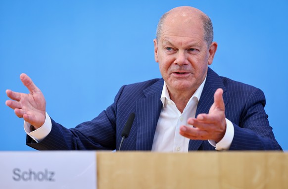 epa11493916 German Chancellor Olaf Scholz talks about domestic and foreign policy issues during the annual summer press conference in Berlin, Germany, 24 July 2024. EPA/HANNIBAL HANSCHKE