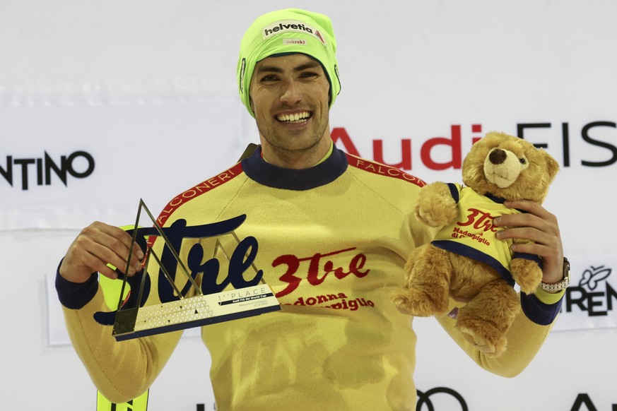 Switzerland&#039;s Daniel Yule celebrates winning an alpine ski, men&#039;s World Cup slalom in Madonna di Campiglio, Italy, Thursday, Dec. 22, 2022. (AP Photo/Gabriele Facciotti) (AP Photo/Alessandro ...