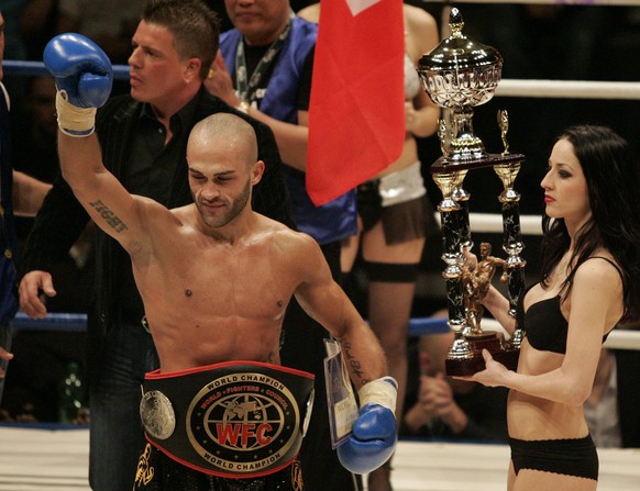 Switzerland&#039;s Paulo Balicha cheers after winning his WFC world championship bout (in the K1 fight category up to 70kg) against Vassili Sish from Belarus, in Basel, Switzerland, Saturday, December ...