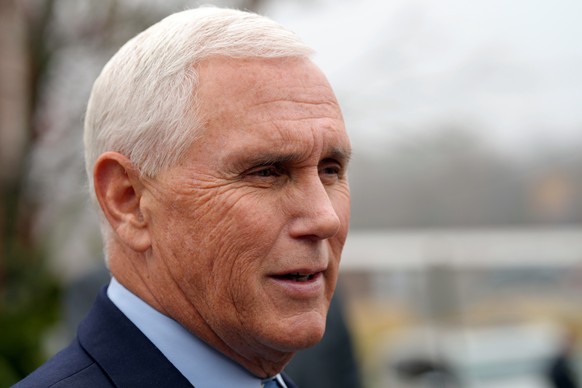 Former Vice President Mike Pence speaks with reporters after remarks to an audience about his new book on Tuesday, Dec. 6, 2022, at Garden Sanctuary Church of God in Rock Hill, S.C. (AP Photo/Meg Kinn ...