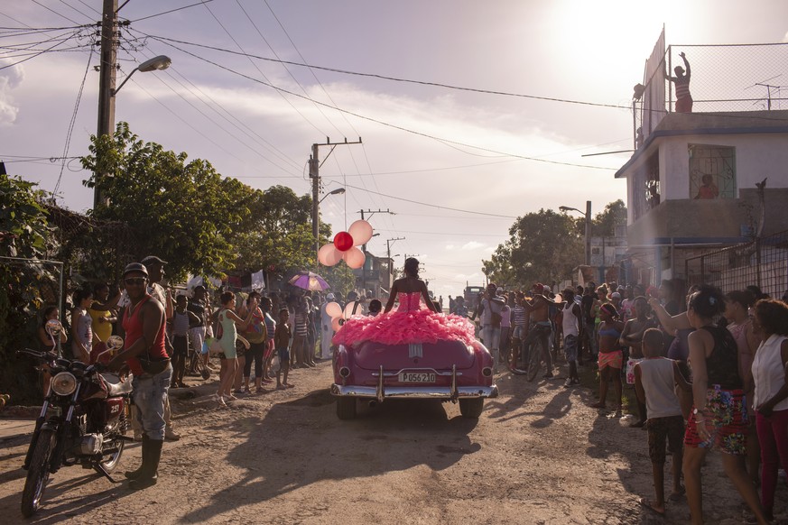In this image released by the World Press Photo Foundation Thursday April 11, 2019, titled "Cubanitas" by Diana Markosian, Magnum Photos, which was awarded first prize in the Contemporary Is ...
