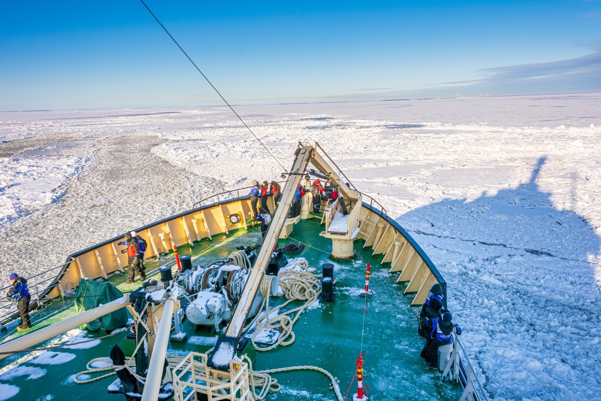 Icebreaker boat in Lapland, Finland, ROVANIEMI, FINLAND - FEB 25, 2020: Ice Breaker boat sailing in Lapland country in northern Finland