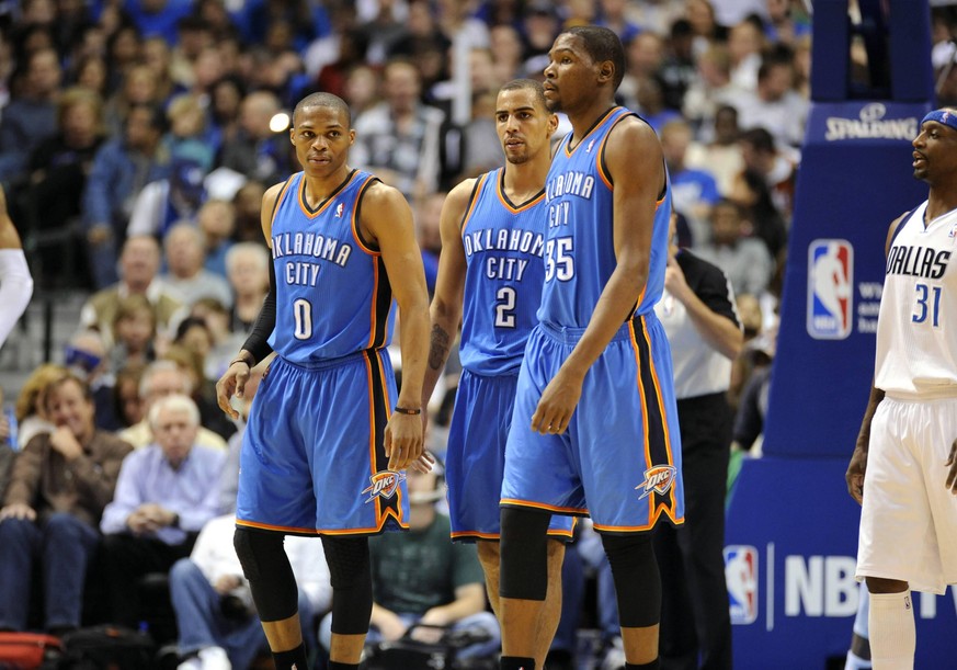 January 06, 2011: (l to r) Oklahoma City Thunder point guard Russell Westbrook 0, Oklahoma City Thunder guard Thabo Sefolosha 2, and Oklahoma City Thunder small forward Kevin Durant 35 during an NBA g ...