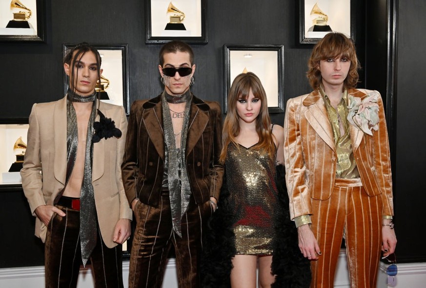 LOS ANGELES, CALIFORNIA - FEBRUARY 05: (L-R) Ethan Torchio, Damiano David, Victoria De Angelis and Thomas Raggi of Måneskin attends the 65th GRAMMY Awards on February 05, 2023 in Los Angeles, Californ ...