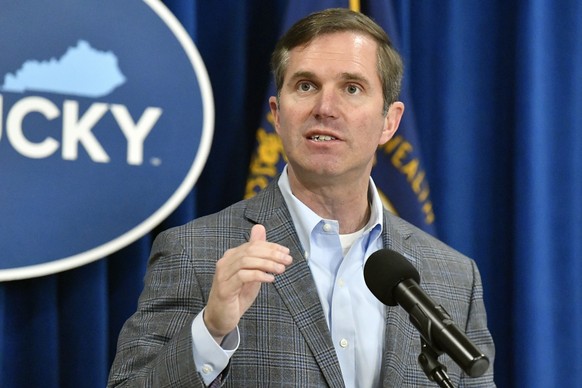 FILE - Kentucky Gov. Andy Beshear speaks in the Rotunda of the state Capitol, March 26, 2024, in Frankfort, Ky. On Thursday, June 27, 2024, Beshear announced that the state will start taking applicati ...