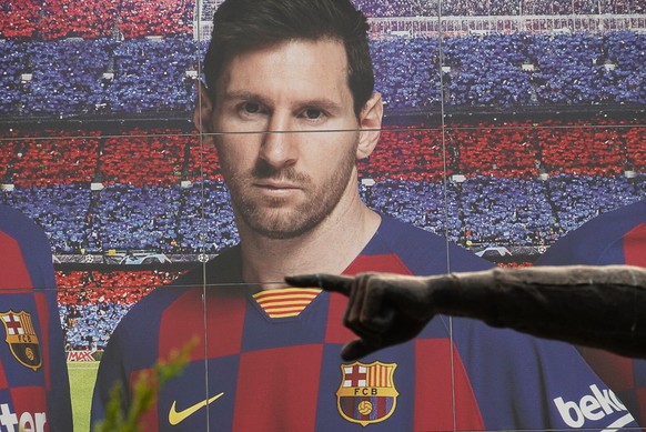 epa08631128 View of a huge banner depicting FC Barcelona&#039;s Argentine forward Lionel Messi in Barcelona, Spain, 28 August 2020. Argentinian forward Lionel Messi, who announced his decision to leav ...