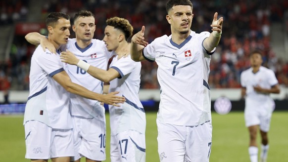 Switzerland&#039;s Zeki Amdouni, front, celebrates with teammates Vincent Sierro, Granit Xhaka and Ruben Vargas, from left, during an international friendly soccer match between Switzerland and Estoni ...