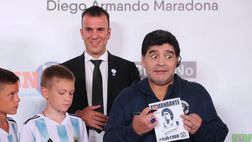 epa06893324 Argentinian soccer legend Diego Maradona (R) attends a press conference in Brest, Belarus, 16 July 2018. Maradona has been appointed as chairman of Belarussian soccer club &#039;Dinamo Bre ...