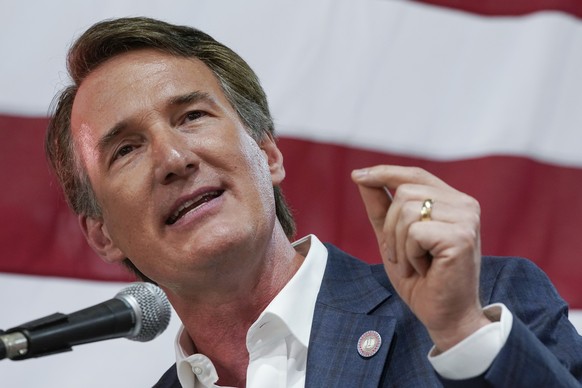 FILE - Virginia Gov. Glenn Youngkin speaks prior to signing the budget at a ceremony at a grocery store June 21, 2022, in Richmond, Va. Youngkin is set to issue a third round of endorsements in Virgin ...