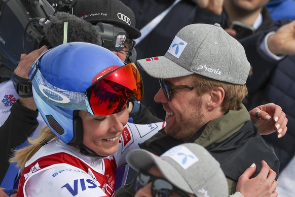 United States&#039; Mikaela Shiffrin, left, hugs Norway&#039;s Aleksander Aamodt Kilde as they stand in the finish area of an alpine ski, women&#039;s World Cup Finals downhill, in Courchevel, France, ...