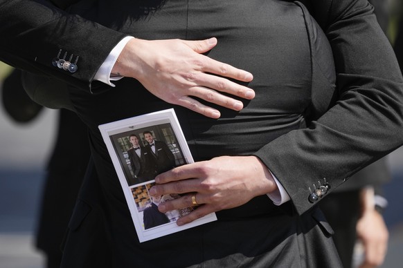 Mourners depart following the funeral for Columbus Blue Jackets hockey player John Gaudreau and his brother Matthew Gaudreau at St. Mary Magdalen Catholic Church in Media, Pa., Monday, Sept. 9, 2024.  ...