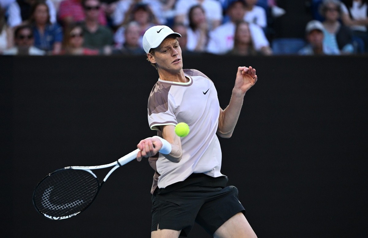 epa11109915 Jannik Sinner of Italy in action during the Men's Singles final against Daniil Medvedev of Russia on Day 15 of the Australian Open tennis tournament in Melbourne, Australia, 28 Januar ...
