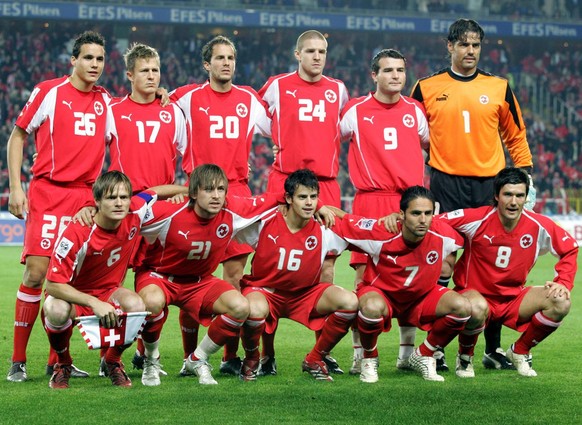 Switzerland national soccer team is seen at Sukru Saracoglu stadium in Istanbul, Turkey, Wednesday, Nov. 16, 2005, before their 2006 World Cup play-off second leg soccer match. Players are foreground  ...