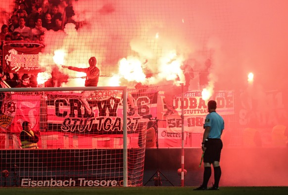 epa07606587 Stuttgart&#039;s fans light flares during the German Bundesliga relegation play-off second leg soccer match between 1. FC Union Berlin and VfB Stuttgart, in Berlin, Germany, 27 May 2019. E ...