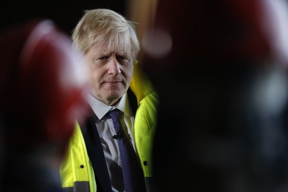 Britain&#039;s Prime Minister Boris Johnson speaks to workers during a visit to Wilton Engineering Services, part of a General Election campaign trail stop in Middlesbrough, England, Wednesday, Nov. 2 ...